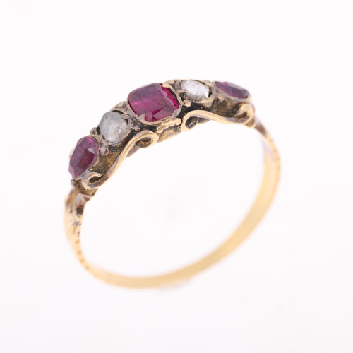 1212 - An Antique Georgian five stone ruby and diamond ring, circa 1820, set with oval and pear-cut rubies ... 