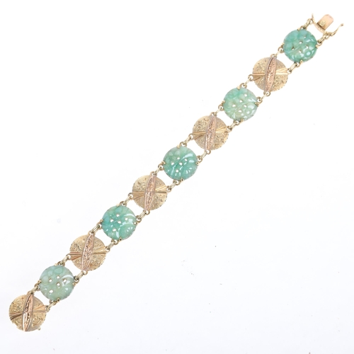 1216 - An 18ct two-colour gold jade panel bracelet, with alternating floral carved and pierced jade, and fo... 