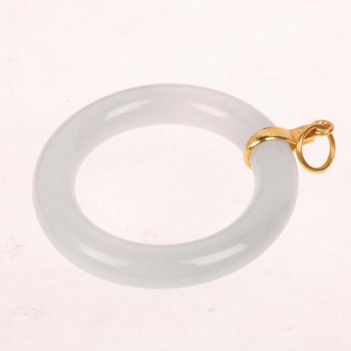 1217 - A Chinese jade hololith ring pendant, with unmarked 18ct gold mount, 35.2mm, 8.4g