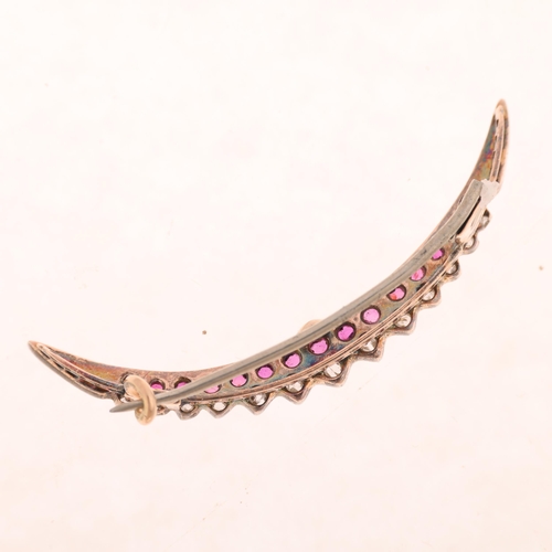 1224 - A Victorian ruby and diamond crescent brooch, circa 1890, set with oval mixed-cut rubies and rose-cu... 