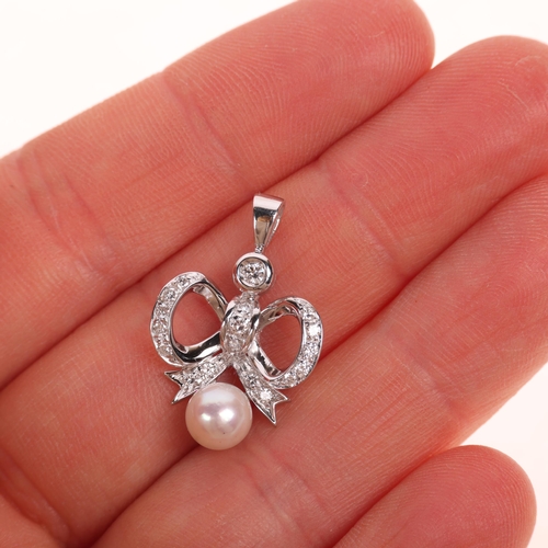 1231 - An 18ct white gold whole pearl and diamond ribbon bow pendant, set with modern round brilliant-cut d... 