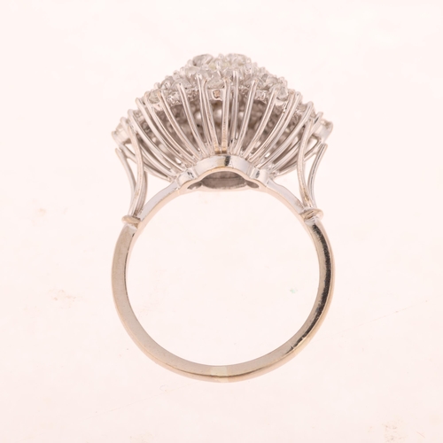 1232 - An 18ct white gold diamond cluster cocktail ring, claw set with old-cut diamonds, total diamond cont... 