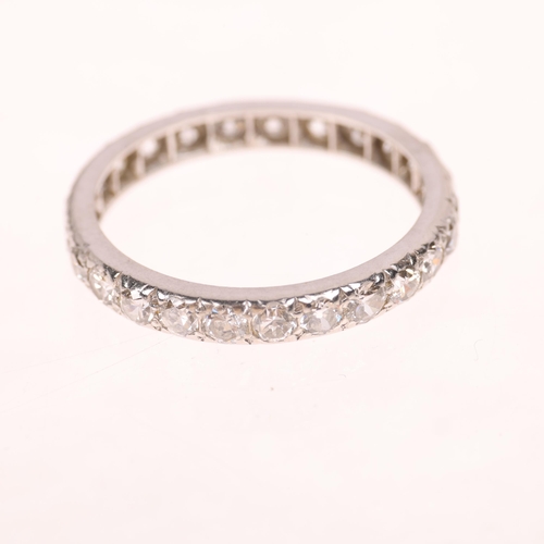 1238 - An Art Deco platinum diamond full eternity ring, set with round transitional-cut diamonds, total dia... 