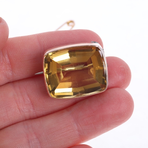 1241 - An Antique Victorian 18ct gold citrine brooch, rub-over set with oval flat-top citrine, unmarked mou... 