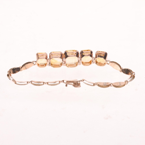 1242 - A Continental five stone citrine bracelet, set with graduated octagonal step-cut citrines, unmarked ... 