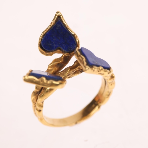 1248 - A Continental 18ct gold lapis lazuli heart dress ring, textured settings, unmarked mount tests as 18... 