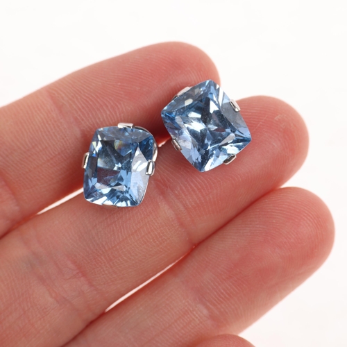 1249 - A pair of 18ct white gold blue synthetic spinel stud earrings, 13mm, 6g