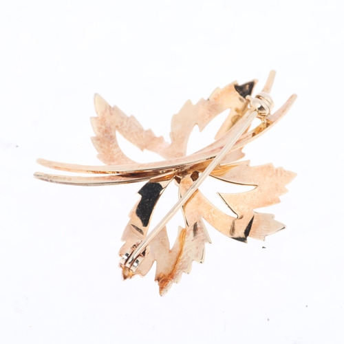 1261 - A 9ct gold stylised leaf brooch, maker E Ltd, import London 1972, 42.7mm, 5.3g