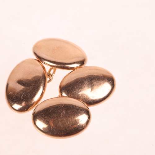 1266 - A pair of Antique 9ct rose gold oval bombe cufflinks, maker C&A, indistinct Birmingham date letter, ... 