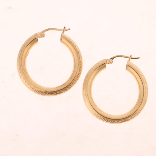 1267 - A pair of 9ct gold hoop earrings, maker FH Ltd, import London 1994, 26.7mm, 3.7g