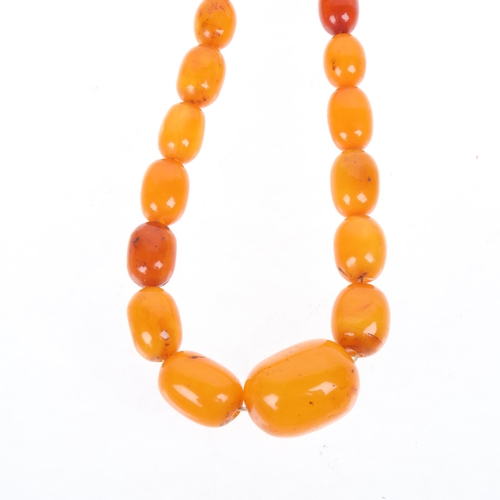 1271 - A Vintage single-strand graduated butterscotch amber bead necklace, beads ranging from 27.4 - 12.8mm... 