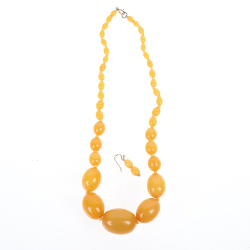 1275 - A Vintage single-strand graduated amber bead necklace, beads ranging from 29.1 - 7.5mm, 44cm, 44g, a... 