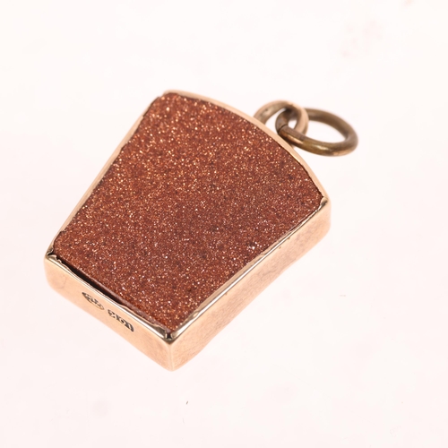 1285 - A Vintage 10k rose gold mother-of-pearl and goldstone Masonic keystone fob, the letters HTWSSTKS rep... 