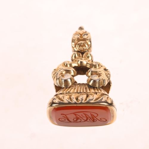 1289 - An Antique 14ct gold carnelian seal fob, the carnelian panel intaglio carved with initials MAJ, in f... 