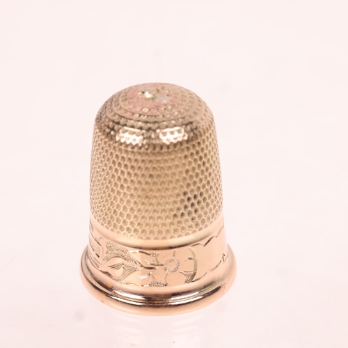 1319 - An Antique 9ct rose gold sewing thimble, by Charles Horner, Chester 1907, size 8, with engraved flor... 