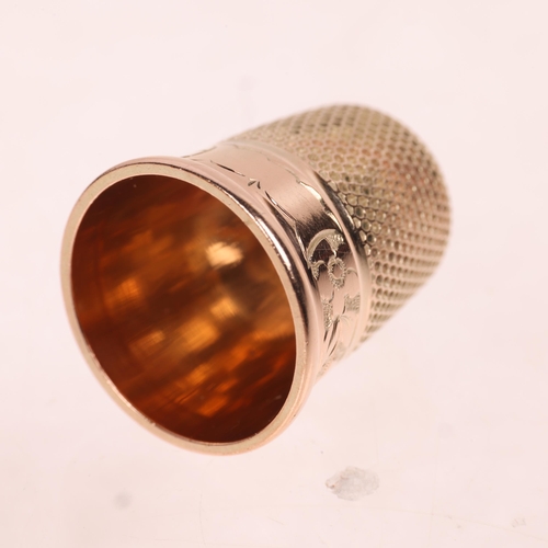 1319 - An Antique 9ct rose gold sewing thimble, by Charles Horner, Chester 1907, size 8, with engraved flor... 