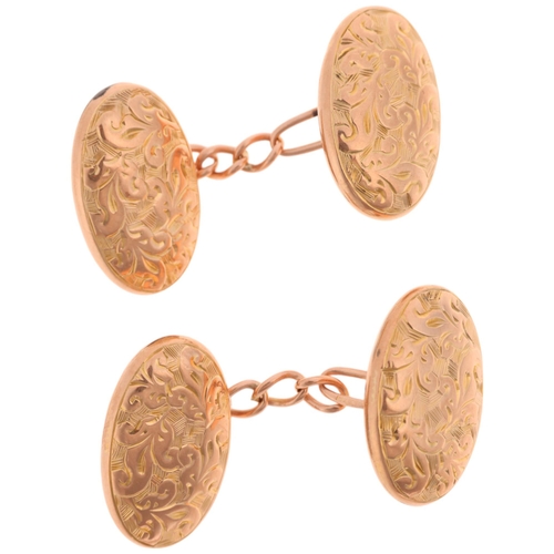 1334 - A pair of Antique 9ct rose gold oval bombe cufflinks, maker W&M, indistinct Chester date letter, fol... 