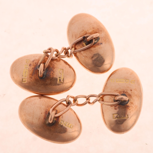 1334 - A pair of Antique 9ct rose gold oval bombe cufflinks, maker W&M, indistinct Chester date letter, fol... 