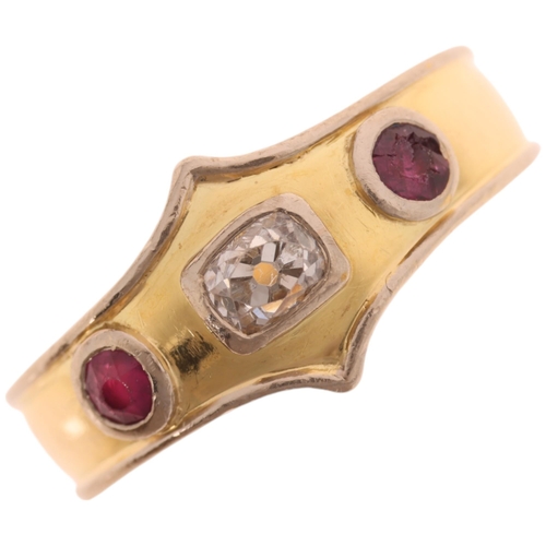 1340 - An 18ct two-colour gold three stone ruby and diamond ring, maker DOM, set with round-cut rubies and ... 