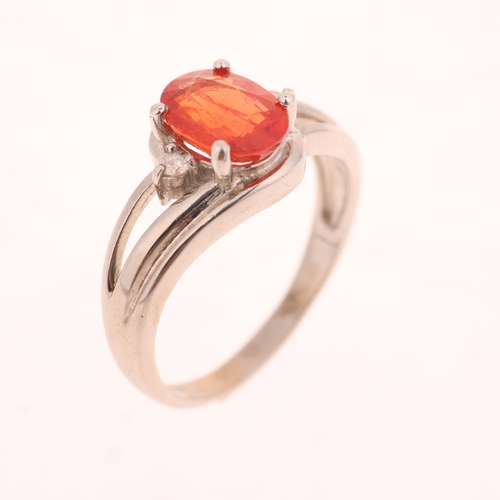 1342 - An 18ct white gold spessartine orange garnet and diamond dress ring, maker GTV, Birmingham 2005, cla... 