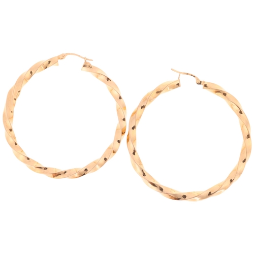 1343 - A pair of 9ct gold twisted hoop earrings, by Unoaerre, 48.5mm, 4.2g