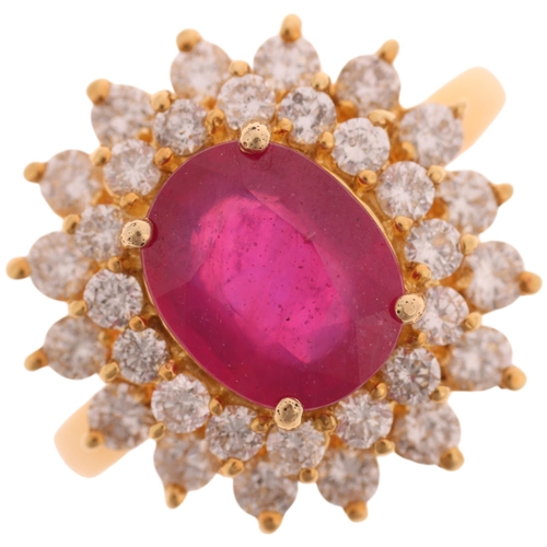 1345 - EFFY - an 18ct gold ruby and diamond cluster ring, set with 3ct oval mixed-cut ruby surrounded by 2 ... 