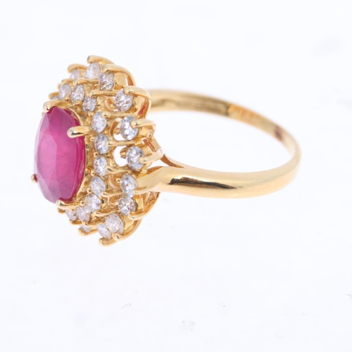 1345 - EFFY - an 18ct gold ruby and diamond cluster ring, set with 3ct oval mixed-cut ruby surrounded by 2 ... 