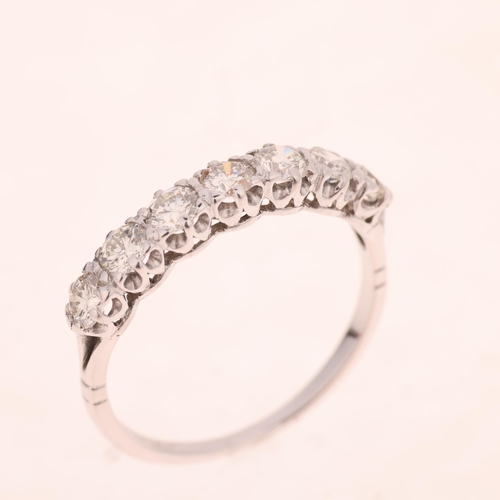 1349 - An 18ct white gold seven stone diamond ring, London 1975, set with modern round brilliant-cut diamon... 