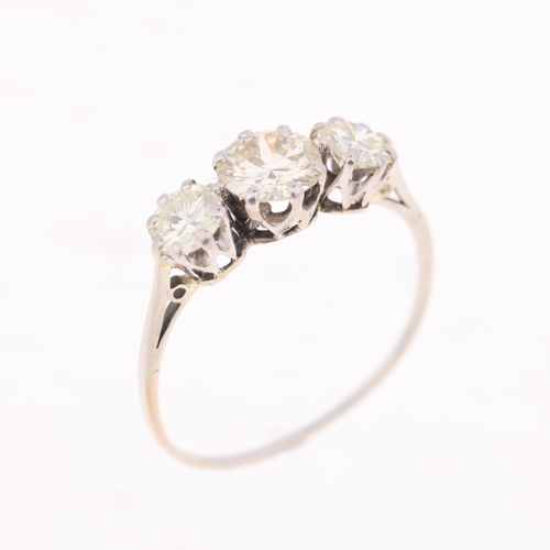 1351 - An 18ct white gold three stone diamond ring, claw set with round brilliant and transitional-cut diam... 