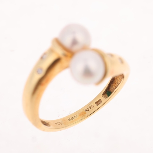 1352 - GARRARD & CO - an 18ct gold cultured pearl and diamond crossover ring, maker G & Co, import London 1... 