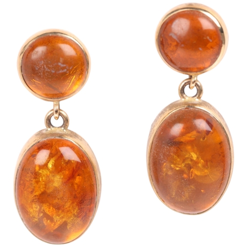 1357 - A pair of 9ct gold amber drop stud earrings, maker EWV, London 1997, set with round and oval cabocho... 