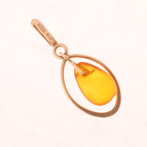 1358 - A Russian 14ct gold amber openwork pendant, 31.7mm, 1.1g