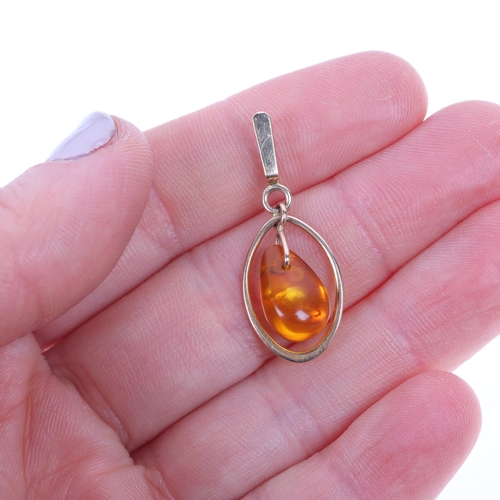 1358 - A Russian 14ct gold amber openwork pendant, 31.7mm, 1.1g