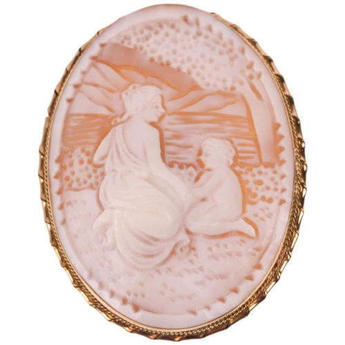 1363 - A Vintage 9ct gold shell cameo brooch, relief carved depicting Classical lady and child beside a lak... 