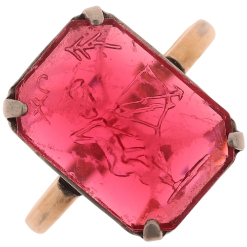 1364 - A Vintage pink glass intaglio 'Cupid' ring, gold plated mount, setting height 14.2mm, size I, 2.3g