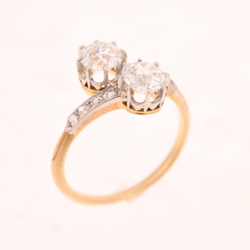 1365 - A French 18ct gold two stone diamond crossover ring, claw set with 2 x 0.75ct old European-cut diamo... 