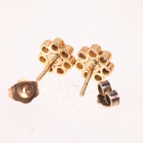 1375 - A pair of 18ct gold diamond flowerhead cluster stud earrings, set with modern round brilliant-cut di... 