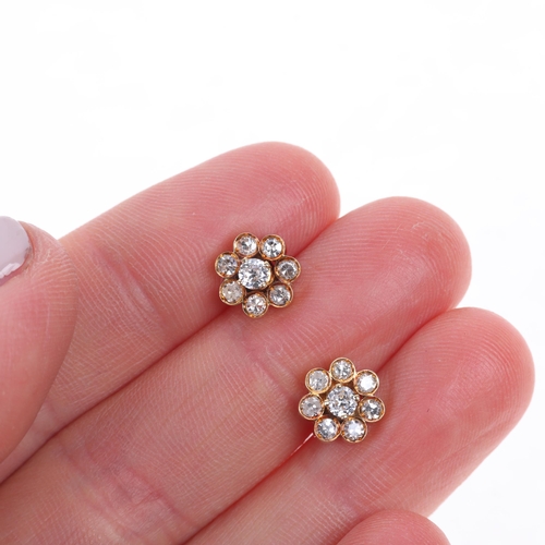 1375 - A pair of 18ct gold diamond flowerhead cluster stud earrings, set with modern round brilliant-cut di... 