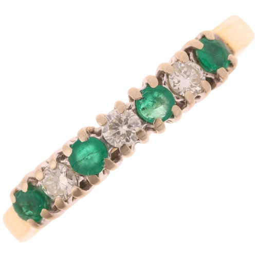 1384 - An 18ct gold seven stone emerald and diamond ring, set with round-cut emeralds and modern round bril... 