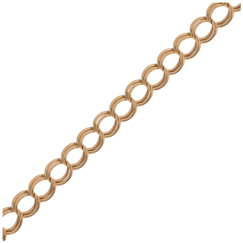 1386 - A 9ct gold double curb link chain bracelet, import London 1980, 18cm, 4.3g