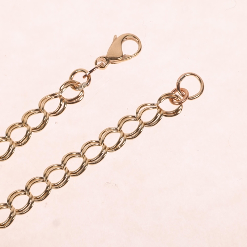 1386 - A 9ct gold double curb link chain bracelet, import London 1980, 18cm, 4.3g