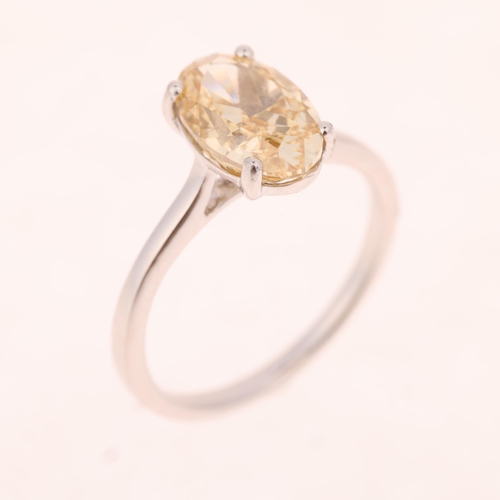 1389 - An 18ct white gold 2.6ct single stone lab-grown fancy intense yellow diamond ring, claw set with ova... 