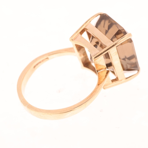 1395 - A 9ct gold smoky quartz dress ring, indistinct maker, Birmingham 1998, claw set with octagonal step-... 