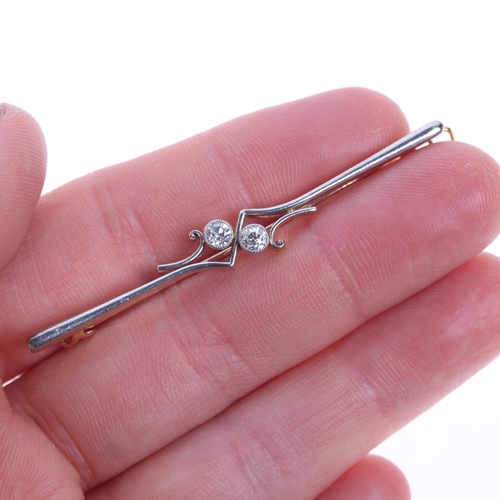 1400 - An Antique 15ct gold two stone diamond bar brooch, millegrain set with old European-cut diamonds, to... 