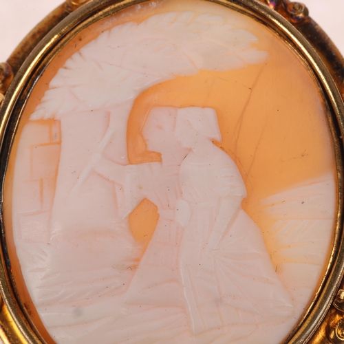 1409 - An Antique shell cameo brooch, relief carved depicting 2 ladies beneath a tree, in gilt-metal foliat... 