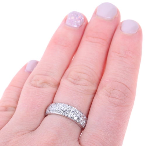 1410 - An 18ct white gold diamond half eternity band ring, maker EW & Co, indistinct hallmarks, pave set wi... 