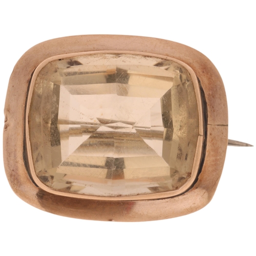 1413 - An Antique 9ct gold smoky quartz brooch, rub-over set with oval flat-top smoky quartz, unmarked moun... 