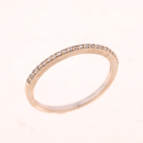 1415 - An 18ct white gold diamond half eternity ring, set with modern round brilliant-cut diamonds, band wi... 