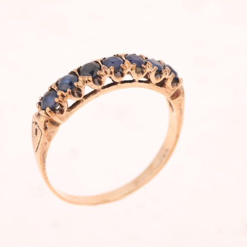 1425 - A 9ct gold seven stone sapphire half hoop ring, maker G&TJ, London 1971, setting height 4mm, size T,... 