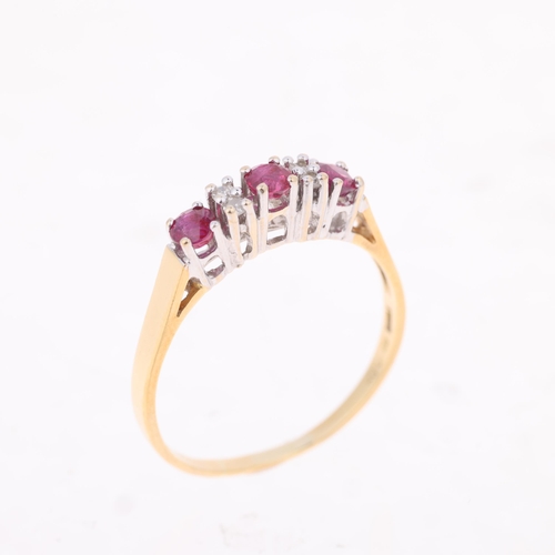 1427 - An 18ct gold ruby and diamond half hoop ring, maker DM, import London 1978, setting height 3.7mm, si... 